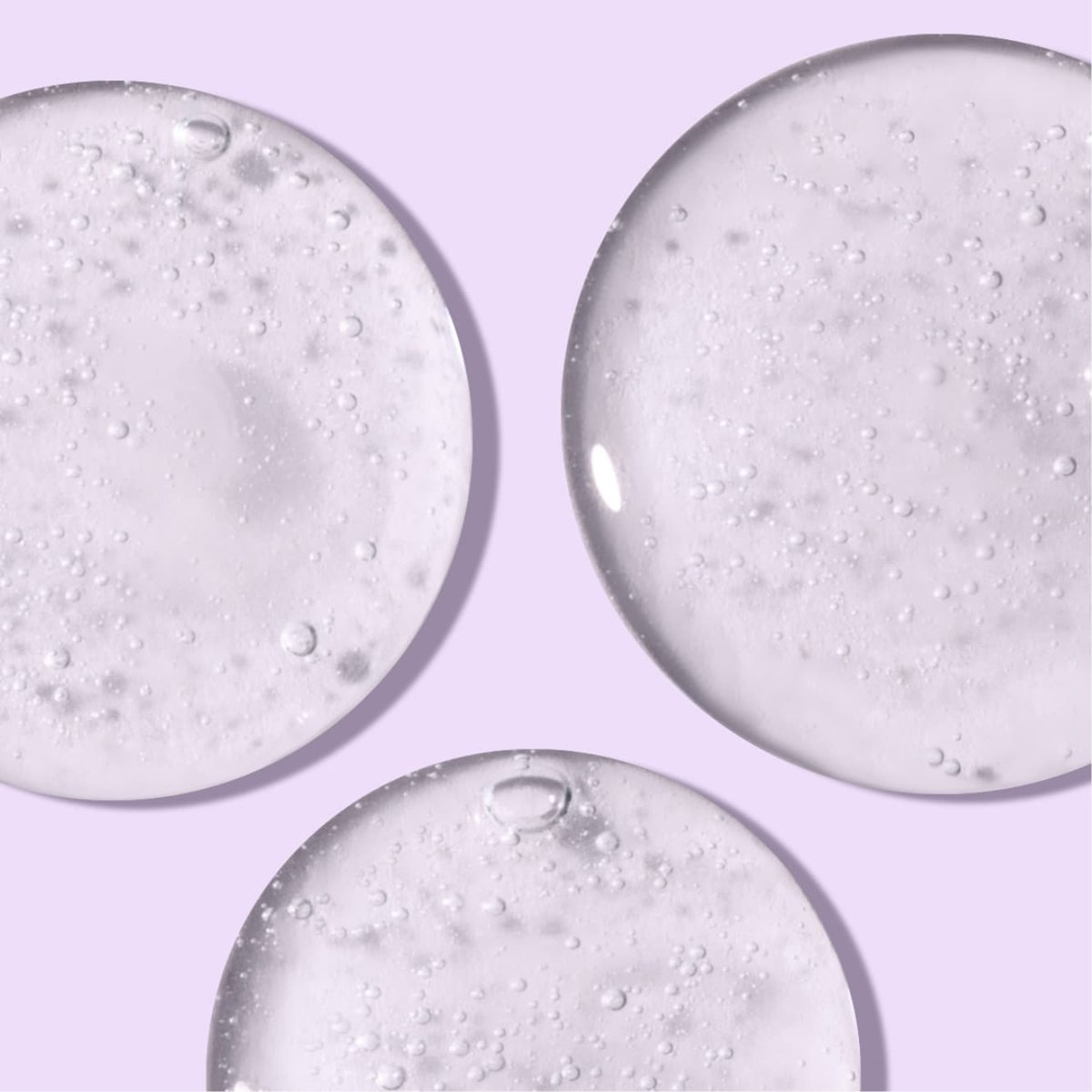 Glazed circles of Night Relaxing face wash in front of light purple background