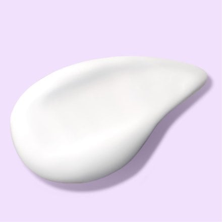 White dollop of Advantage oil free moisturizer over light purple background