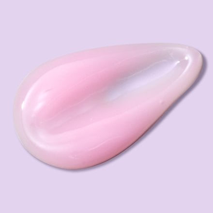 Close up of tear drop of watermelon gel moisturizer in front of light purple background